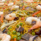 Paella Mixta mariscos + carnes $45.000  Cada Plato (Pedido Mínimo 6) Ver tamaños →