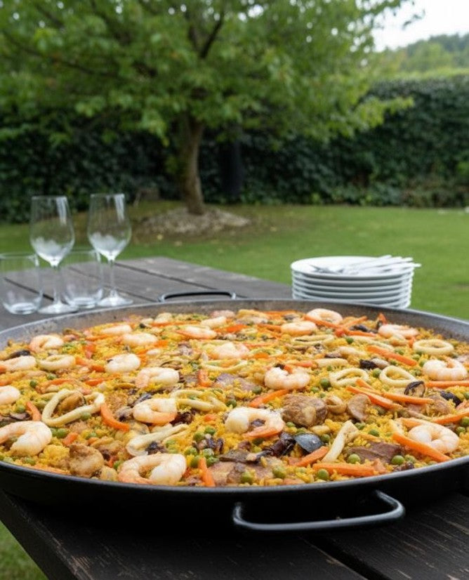 Paella Mixta mariscos + carnes $45.000  Cada Plato (Pedido Mínimo 6) Ver tamaños →
